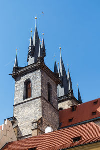 Low angle view of building against blue sky