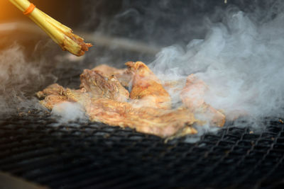 Close-up of smoke emitting from fire