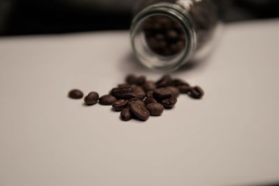 Close-up of coffee beans on table