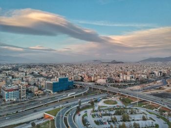 High angle view of city street against sky