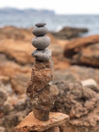 Close-up of stone stack on rock