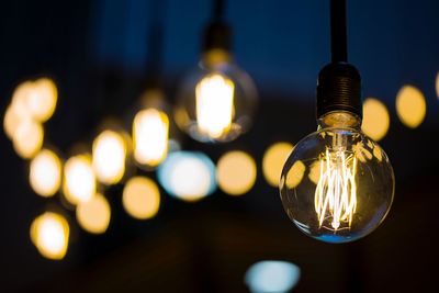 Close-up of illuminated light bulb