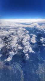 Aerial view of clouds over blue sky