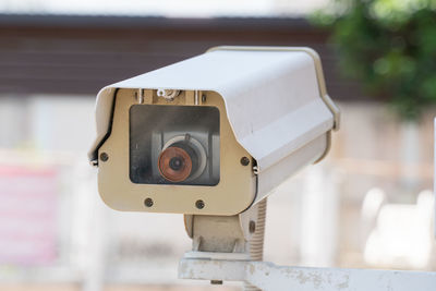 Close-up of camera on table