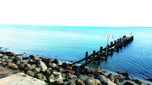 Scenic view of sea against clear sky