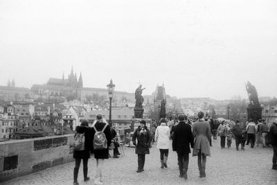 Group of people in front of buildings