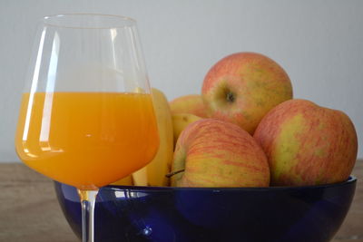 Close-up of fruits in bowl on table