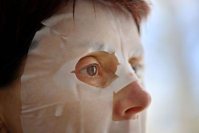 Close-up of woman with face mask