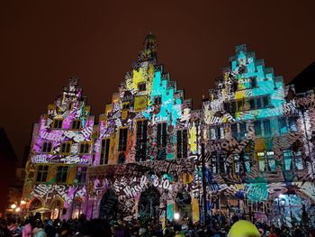 Low angle view of crowd at night