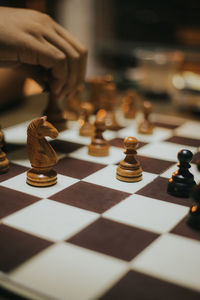 Close-up of chess pieces on table