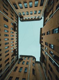 Low angle view of buildings against clear sky