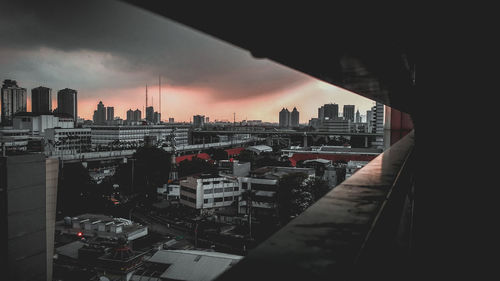 High angle view of buildings against sky during sunset