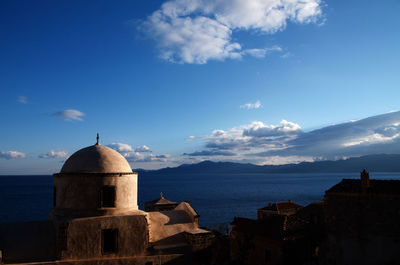 Scenic view of dome and sea against sky