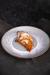 Close-up of cookies in plate on table