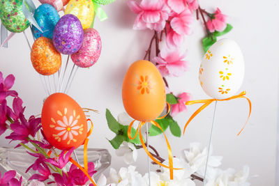 Close-up of multi colored flowers on table