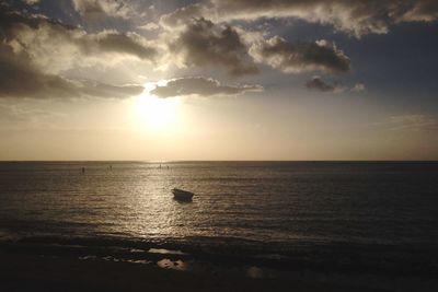 Scenic view of sea at sunset