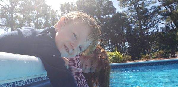 Portrait of boy in swimming pool