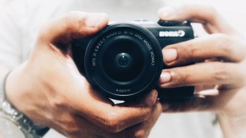 Midsection of man photographing