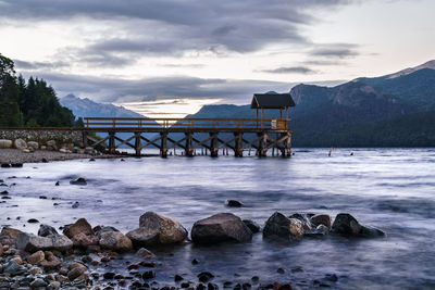 Bridge over bay against sky