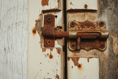 Close-up of old rusty metal door