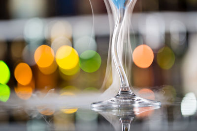 Close-up of wineglass on table