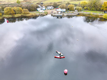 High angle view of people on boat in lake