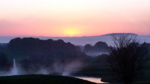 Scenic view of mountains during sunset