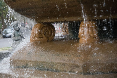 City viewed through wet window