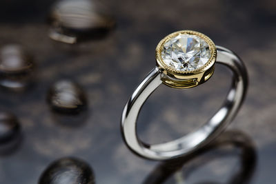 Close-up of wedding rings on metal