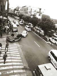 High angle view of people on street in city