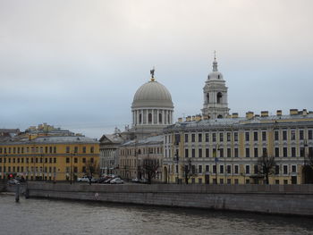 View of buildings against sky in city