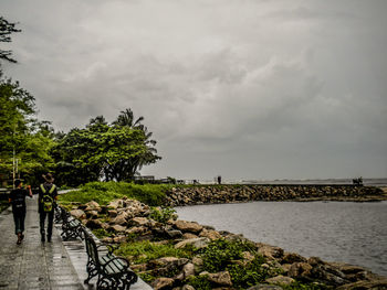 Scenic view of sea against cloudy sky