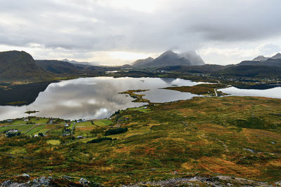 Panoramic view of landscape, sea and mountains against clear sky on moskenesoya lofoten north norway