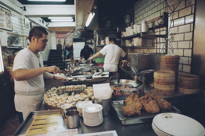 Group of people preparing food