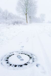 Text on snow covered land