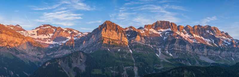 Panoramic view of mountain range against sky