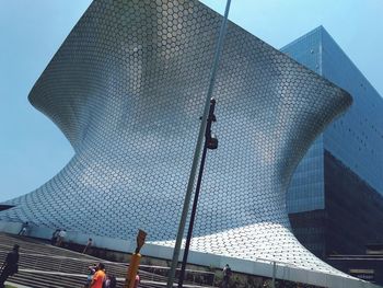 Low angle view of modern building against sky