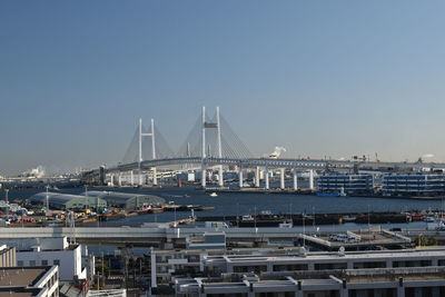 View of suspension bridge in city