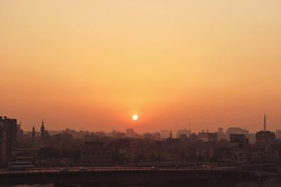 High angle view of cityscape against sky during sunset