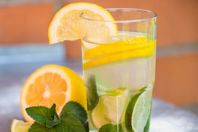 Close-up of orange juice on table