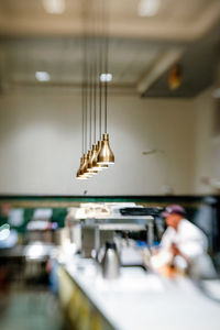 Man hanging in kitchen