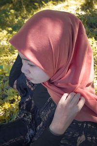 Midsection of woman standing outdoors