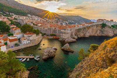 Shot of the famous city of dubrovnik. suluci beach and old town at sunrise.