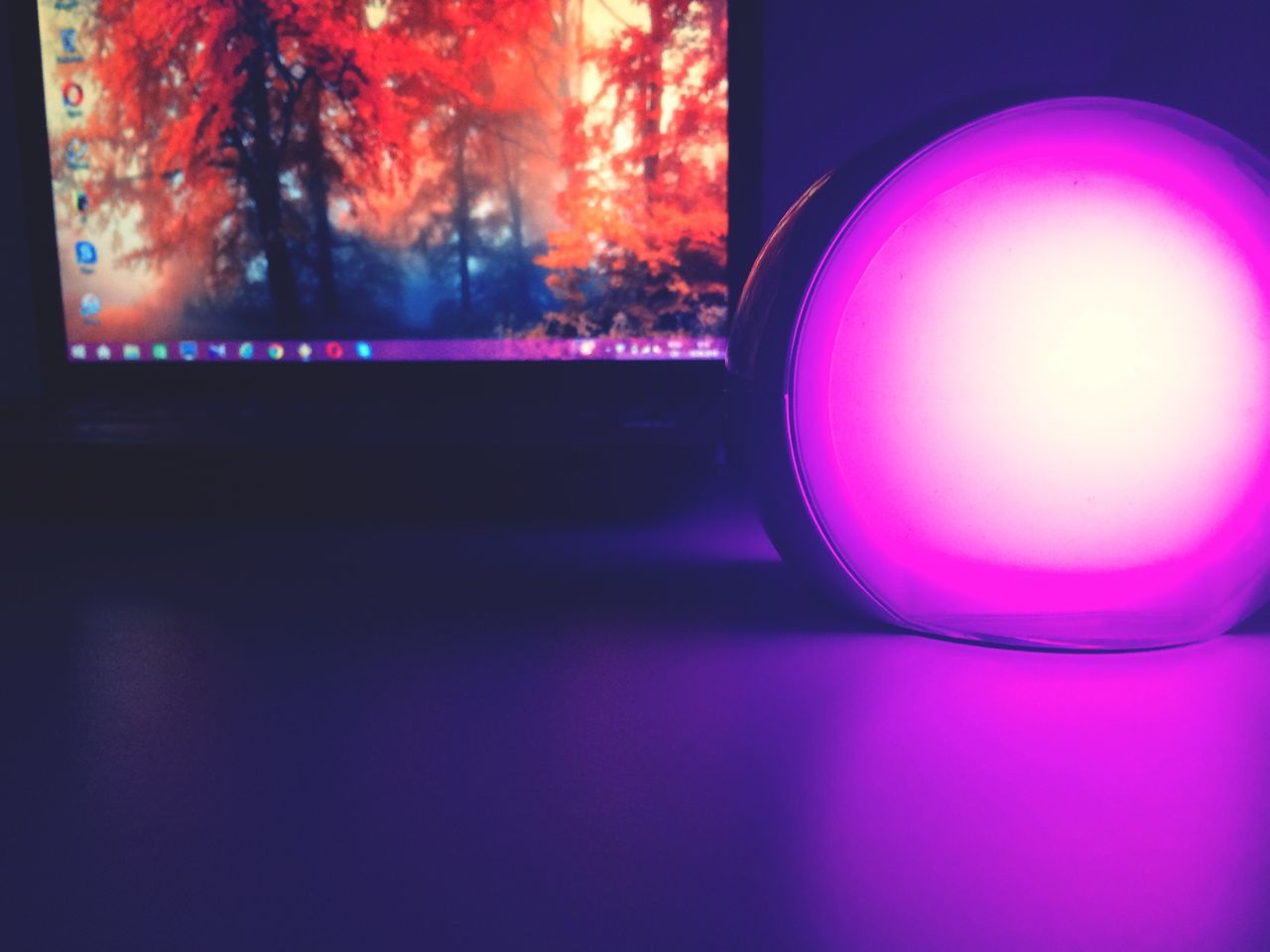 illuminated, indoors, close-up, ball, glass - material, reflection, electric light, dark, pink color, lit