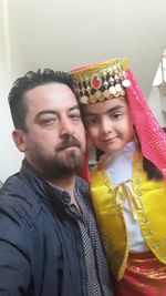 Portrait of couple kissing