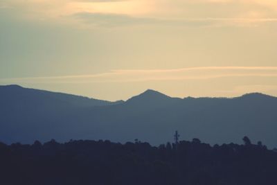 Silhouette of mountains against sky