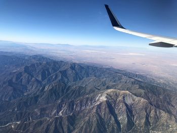 Aerial view of mountains against sky