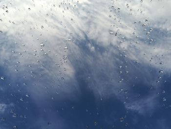 Full frame shot of wet glass window