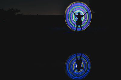 Illuminated light painting at night