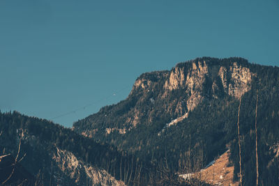 Low angle view of mountain against clear sky